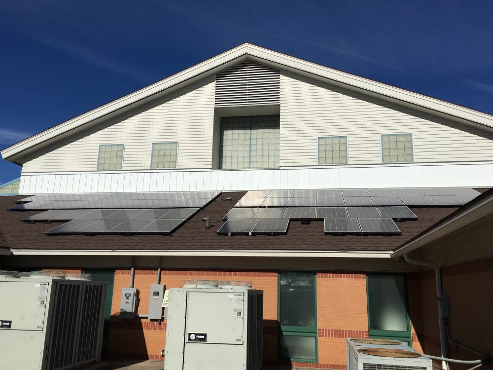 Youth Opportunity Center (YOC), shown above, Kennedy Library, ecoREHAB of Muncie, Inc. and the Unitarian Universalist Church of Muncie received grants from&nbsp;The Solar Uniting Neighbors Program&nbsp;to help purchase solar panels to offset electrical costs.&nbsp;The panels at YOC&nbsp;power 15 percent of the facility, and they&nbsp;plan to buy more panels if the&nbsp;opportunity&nbsp;arrises. DN PHOTO MICHELLE KAUFMAN