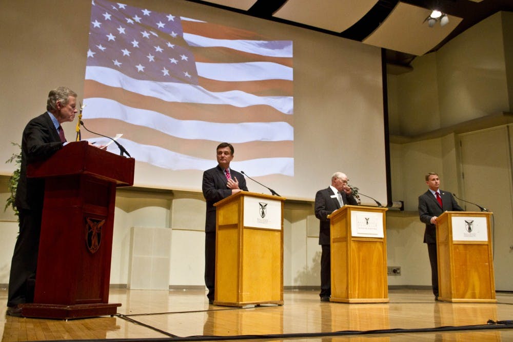 Indiana's 6th District congressional debate was held Tuesday night with Republican candidate Luke Messer, left, Libertarian candidate Rex Bell, middle, and Democrat candidate Brad Bookout, right, in Pruis Hall. They addressed a number of issues including education, tax cuts, and health care. DN PHOTO EMMA FLYNN