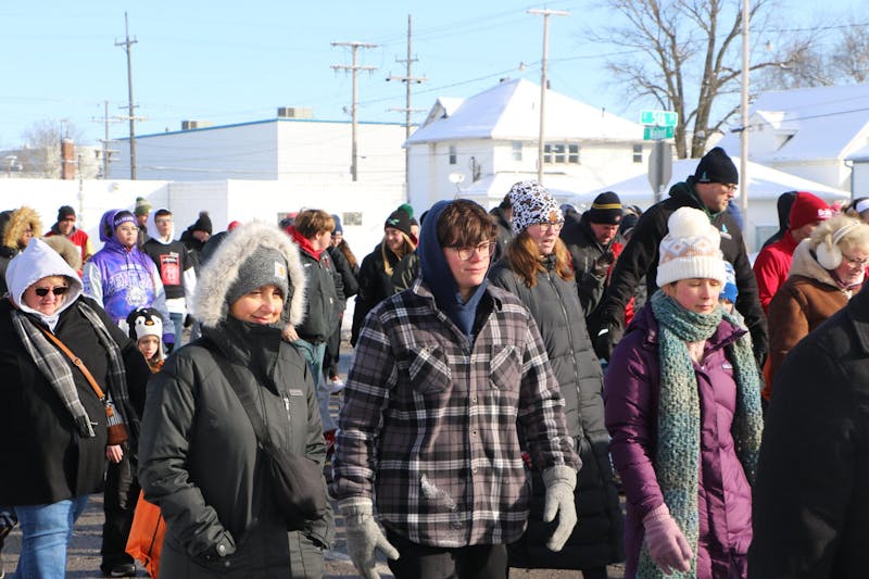 Muncie community members participate in Muncie Missions 'Walk a Mile in My Shoes' event, Feb. 17. The event raises awareness for local homelessness. Zach Gonzalez, DN.