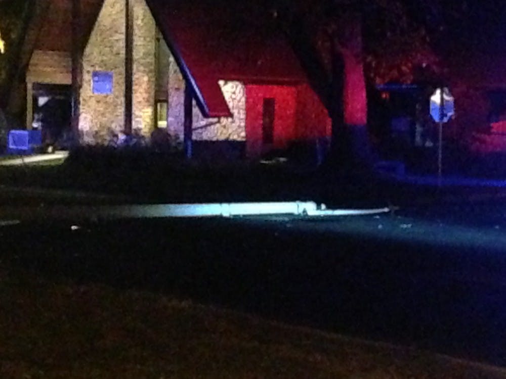 A student hit an electrical pole with his car Oct. 19, causing a closure on Riverside Avenue. DN PHOTO ROSE SKELLY 