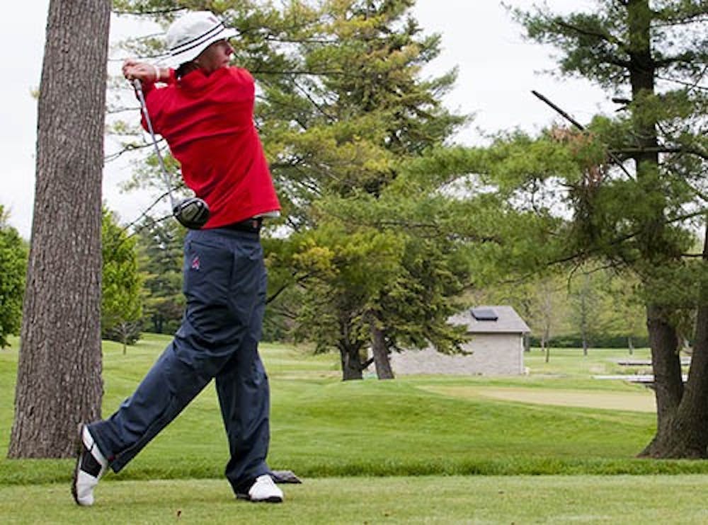 Tyler Merkel takes a swing at the Earl Yestingsmeier Invitational in Muncie on April 21, 2012. Merkel finished three rounds with a score of 214 at the Pinehurst Intercollegiate tournament March 10 to 12, 2013. Ball State won with a score of 885. DN FILE PHOTO BOBBY ELLIS