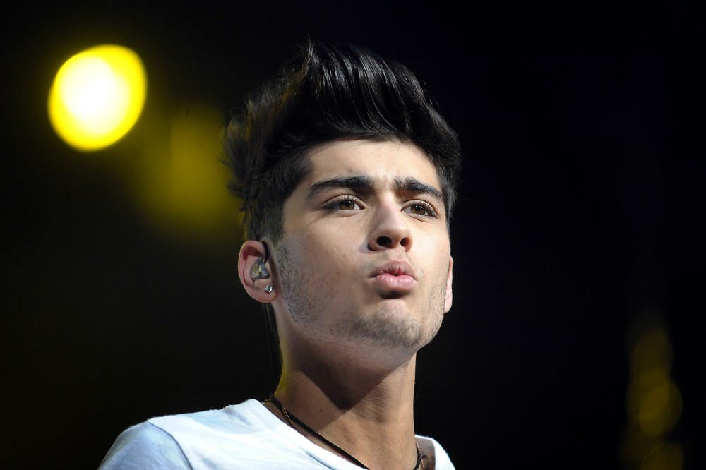 Zayn Malik of One Direction performs at the Bank Atlantic Center in Sunrise, Florida, Sunday, July 1, 2012. (Robert Duyos/Sun Sentinel/MCT)