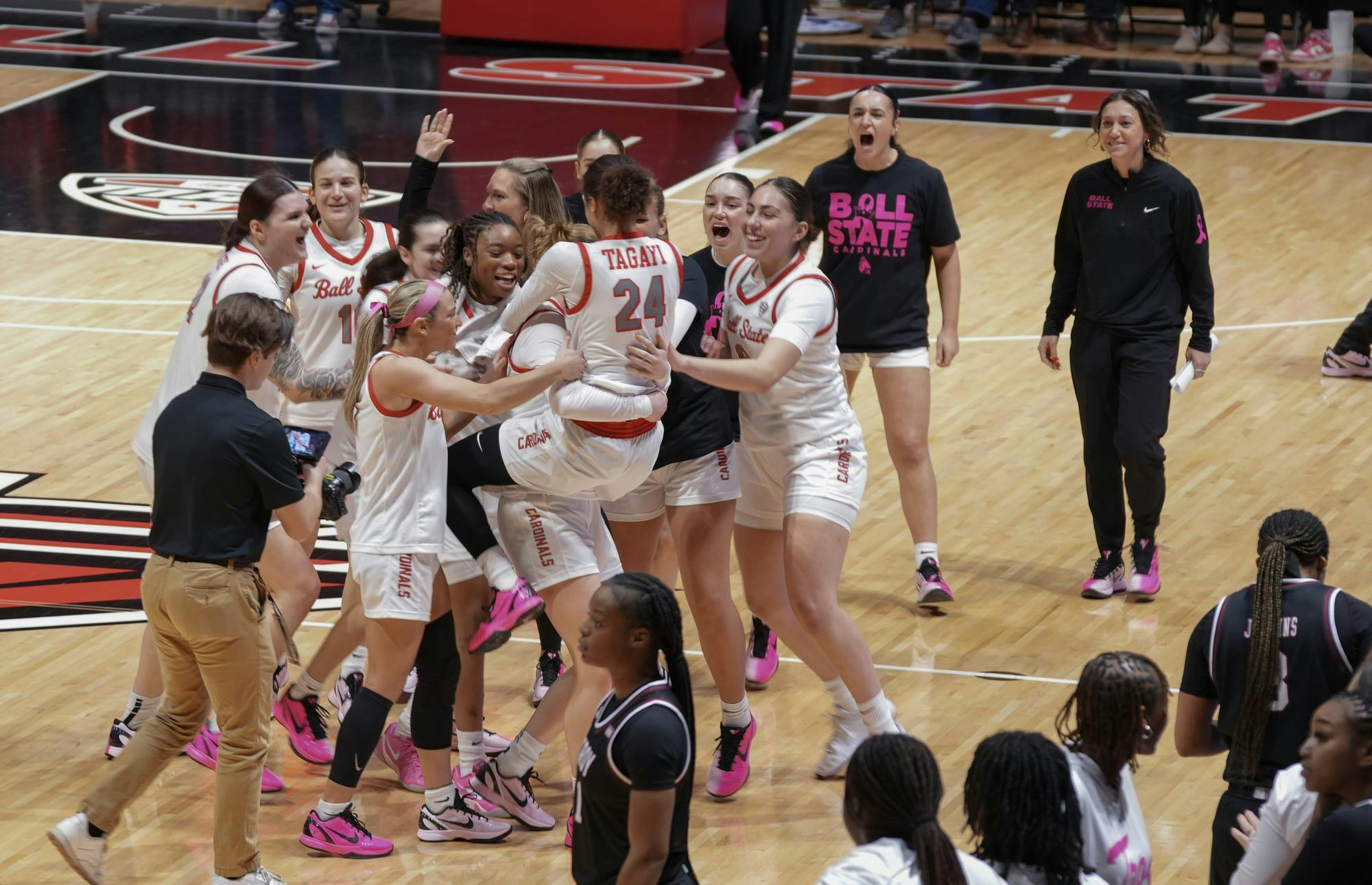 Ball State Women’s Basketball team rushes the court after beating Troy 86-87 Feb. 7at Worthen Arena. Ball State is now 19-5 overall. Kyle Ingermann, DN