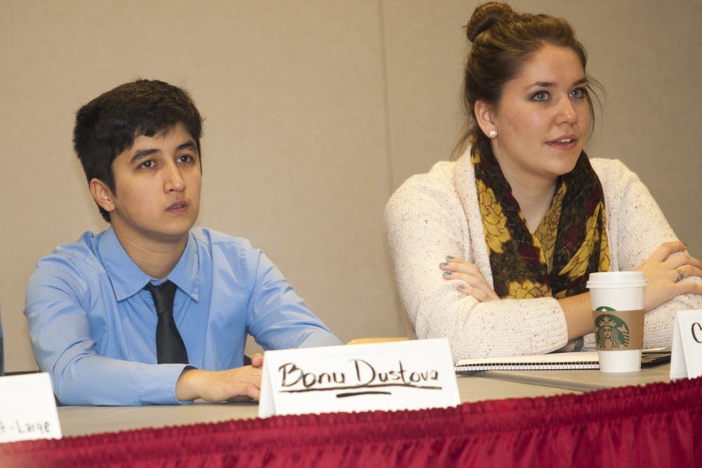 Banu Dustova, a foreign exchange student, sits in her seat of the SGA senate at the group's meeting on Oct 29, 2014. Dustova joined SGA because she felt her needs and rights as a foreign exchange student were not being meet. 