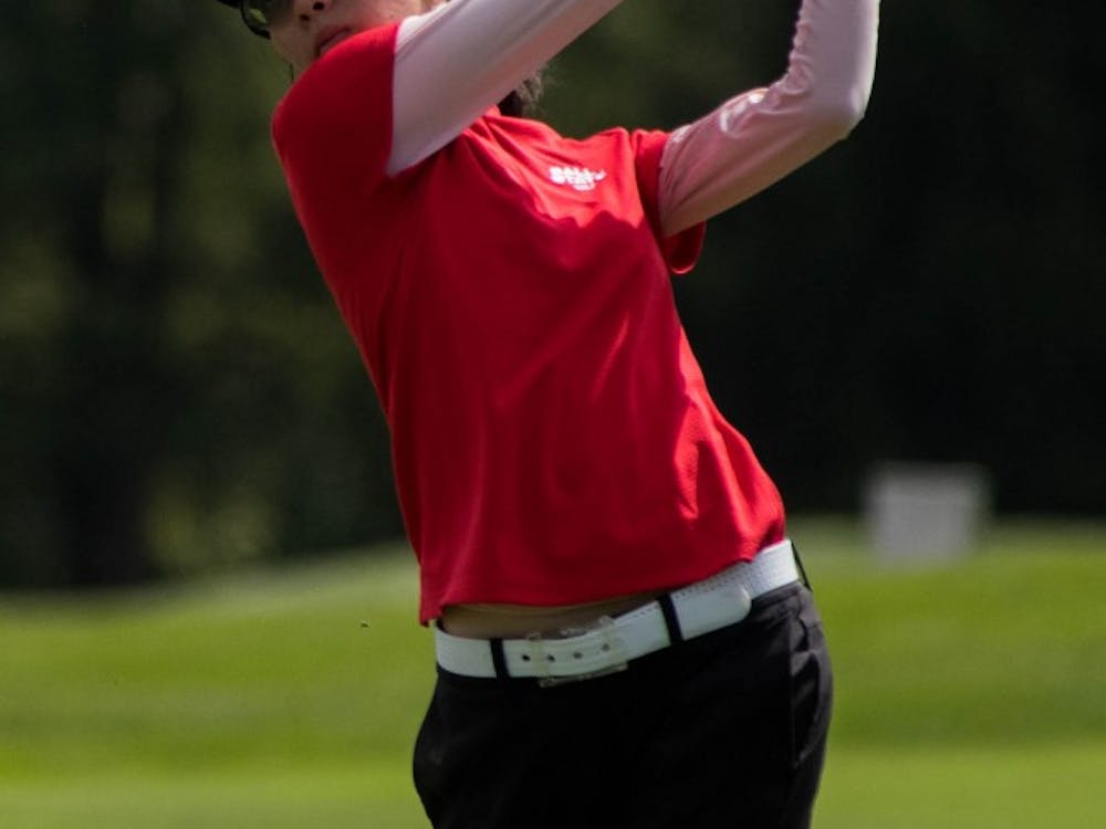 Freshman Ja Santadusit aims her second stroke for the green Sept. 17, 2018, at the Players Club in Yorktown, Indiana for the Cardinal Classic Golf Tournament. Seventeen teams were in attendance for the two-day tournament with 36 holes played the first day and 16 on the second. Eric Pritchett,DN