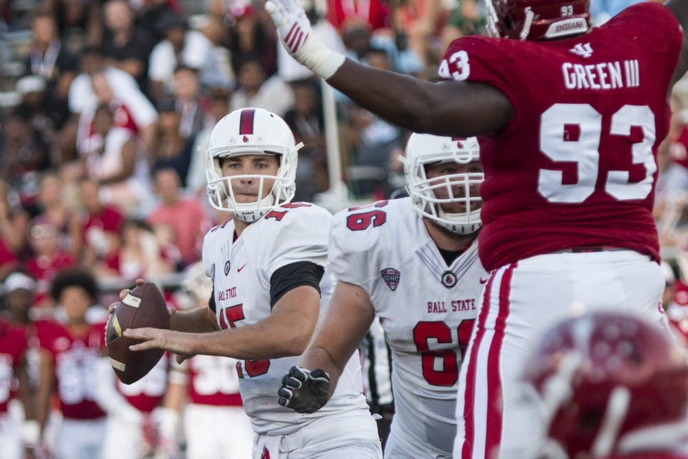 Ball State quarterback Riley Neal looks for a receiver downfield in a 30-20 loss to Indiana at Memorial Field on Sept. 10. Neal and the Cardinals fell to 1-1 as their late&nbsp;comeback attempt fell short. DN Photo // Grace Hollars