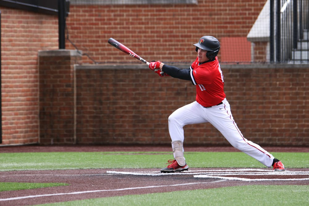 Junior outfielder/first baseman Decker Scheffler hits the ball in a game against Northern Illinois April 23 at First Merchants Ballpark. Schefffler had three hits during the game. Amber Pietz, DN