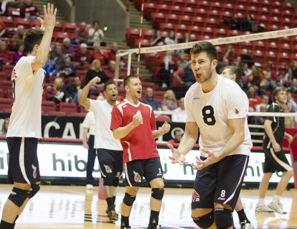 Sophomore setter Hiago Garchet celebrates after scoring a point in the second set against Belmont Abbey on March 7 at Worthen Arena. Ball State won 3-0. 