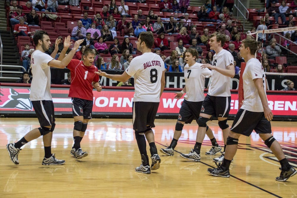 Members of the Ball State men's volleyball team celebrate after winning a point during the game against Grand Canyon on March 13 at Worthen Arena. DN PHOTO ALAINA JAYE HALSEY