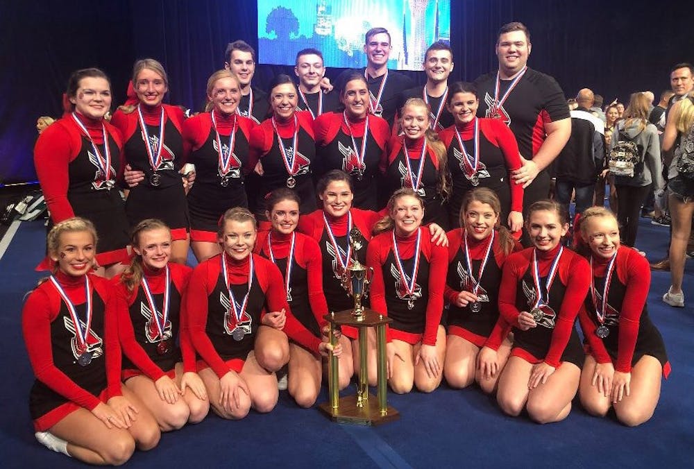 <p>Ball State cheer team poses with their second place trophy at the Universal Cheerleaders Association in Orlando, Florida Jan. 12-14. They second place finish was a program best. <strong>Brenda Jamerson, Photo Provided</strong></p>
