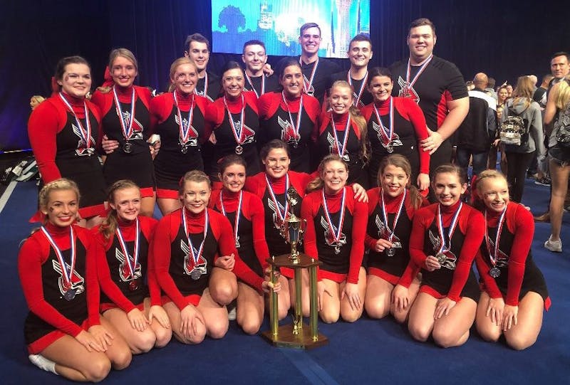 Ball State cheer team poses with their second place trophy at the Universal Cheerleaders Association in Orlando, Florida Jan. 12-14. They second place finish was a program best. Brenda Jamerson, Photo Provided