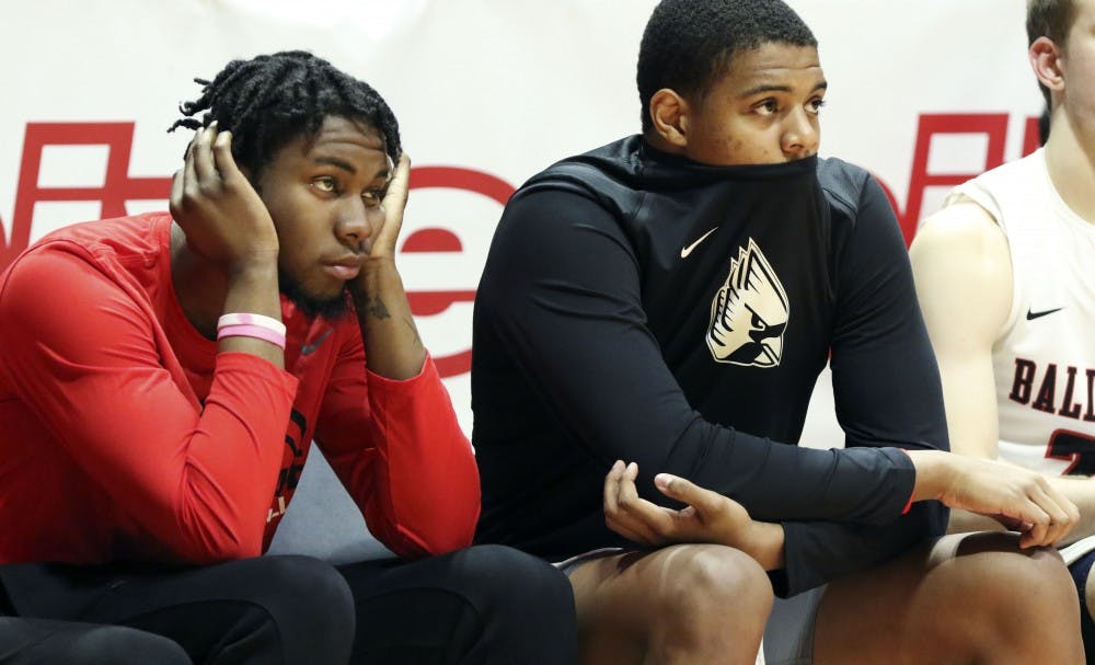 Ball State freshman guard Kani Acree and freshman guard Jarron Coleman watch the Cardinals' during their game against Miami University Jan. 22, 2019 in John E. Worthen Arena. Ball State lost 65 to 71. Paige Grider, DN