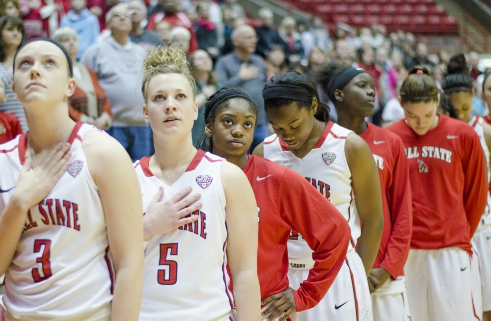 Members of the women's basketball team listen to the National Anthem before the game against Western Michigan on Jan. 10 at Worthen Arena. DN PHOTO BREANNA DAUGHERTY