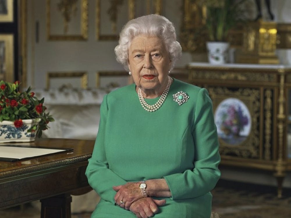 Britain's Queen Elizabeth II addresses the nation and the Commonwealth from Windsor Castle, April 5, 2020, in Windsor, England. The monarch made a rare address, calling on Britons to rise to the challenge of the coronavirus pandemic, to exercise self-discipline in “an increasingly challenging time." (Buckingham Palace via AP)