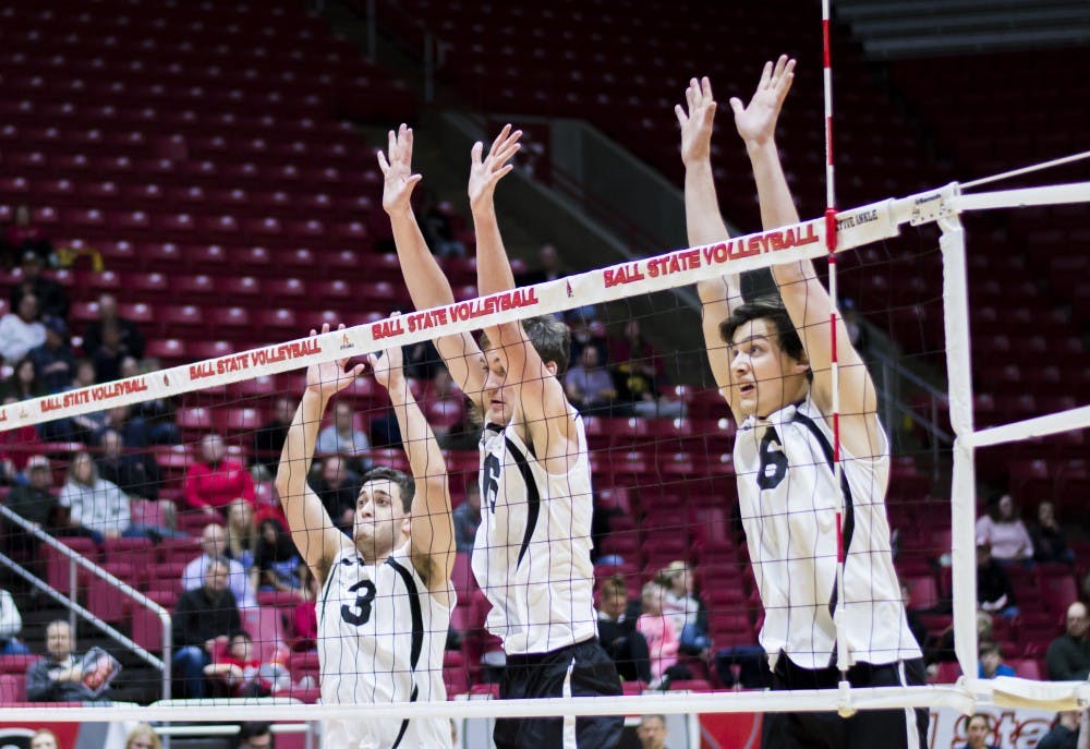 <p>Ball State's setter Connor Gross, middle attacker Matt Walsh and outside attacker Brendan Surane attempt to block the ball during the game against Saint Francis Jan. on 12 in Worthen Arena. The Cardinals won 3-0. Teri Lightning Jr., DN</p>