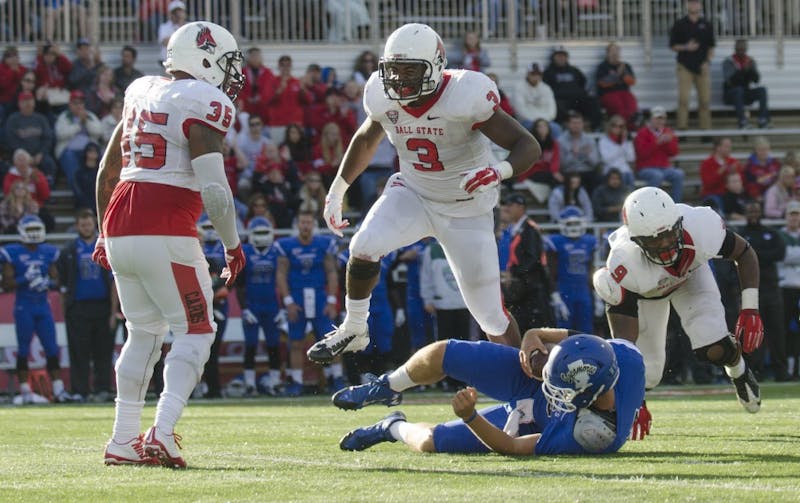 Senior defensive end Nick Miles celebrates after sacking the Indiana State quarterback during the game on Sept. 13 at Scheumann Stadium. DN PHOTO BREANNA DAUGHERTY 