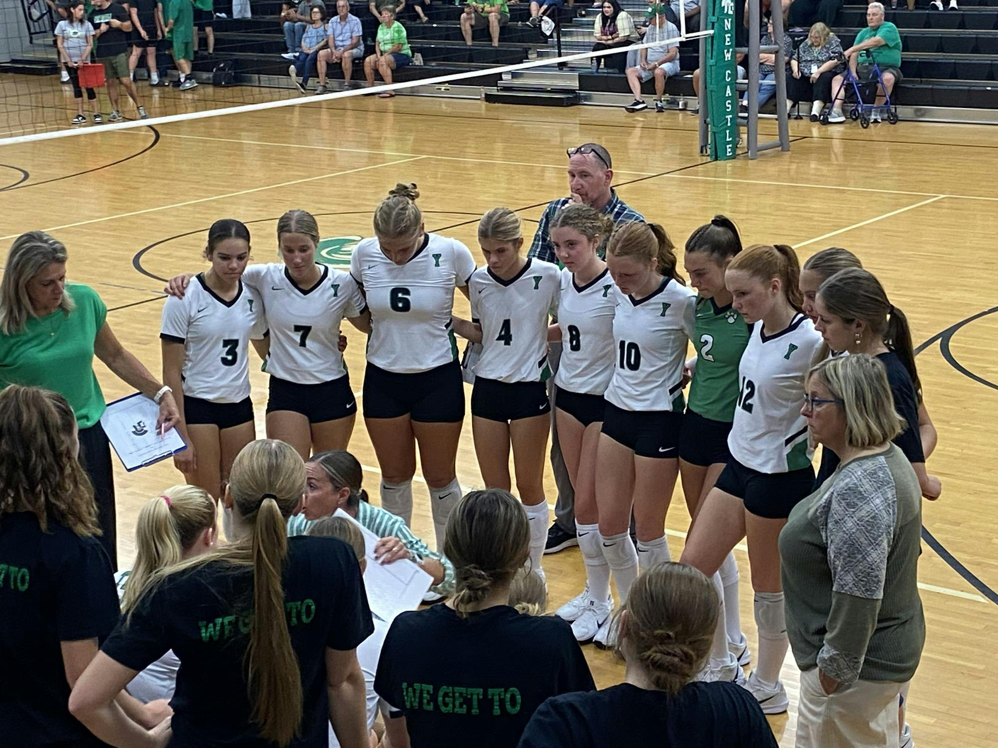 Tigers huddle up to come together to talk about what's going on. Tigers win a hard fought battle 