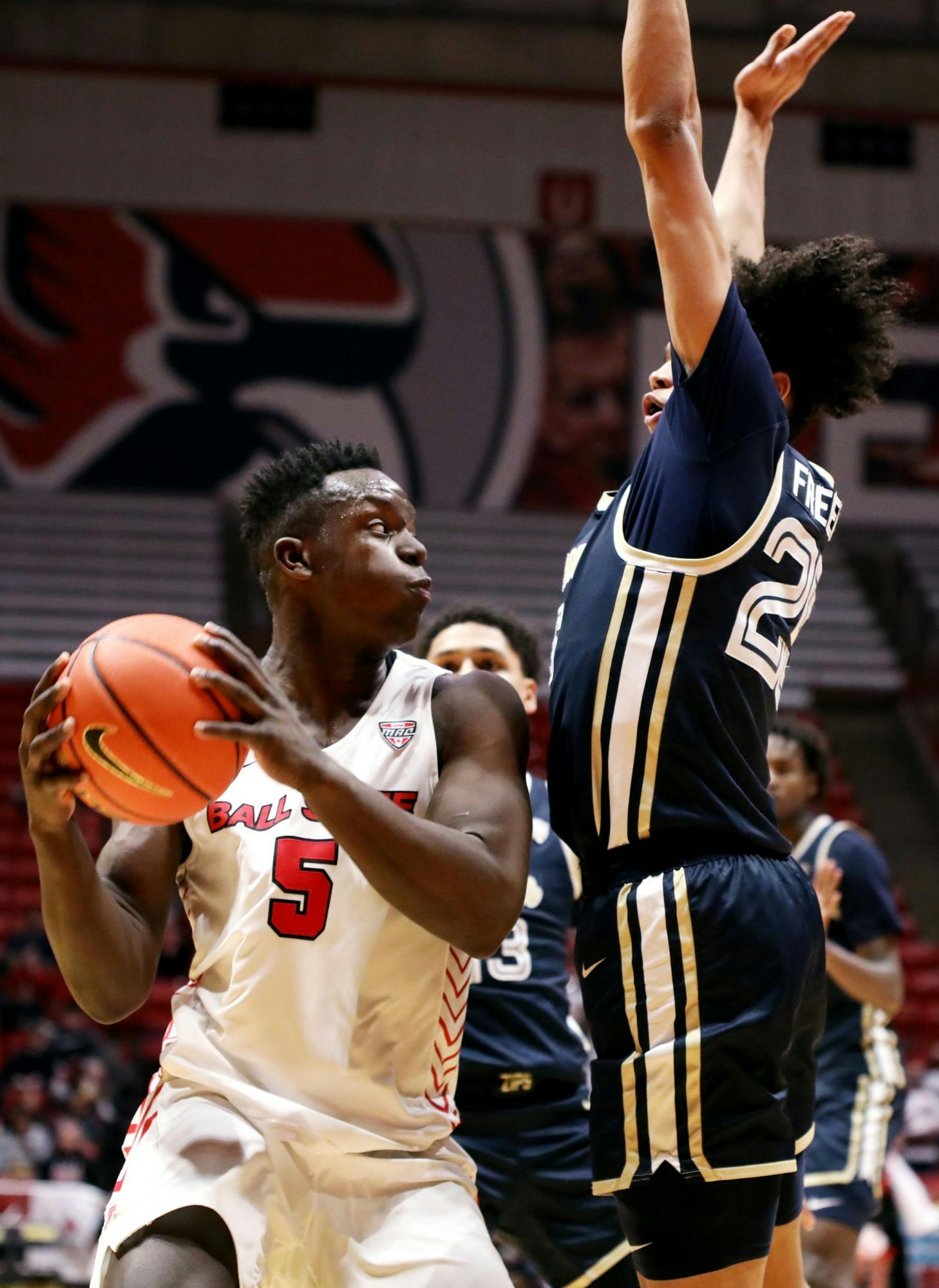 Freshman center Payton Sparks looks to pass to a teammate in a game against Akron March 1 at Worthen Arena. Sparks had six rebounds during the game. Amber Pietz, DN