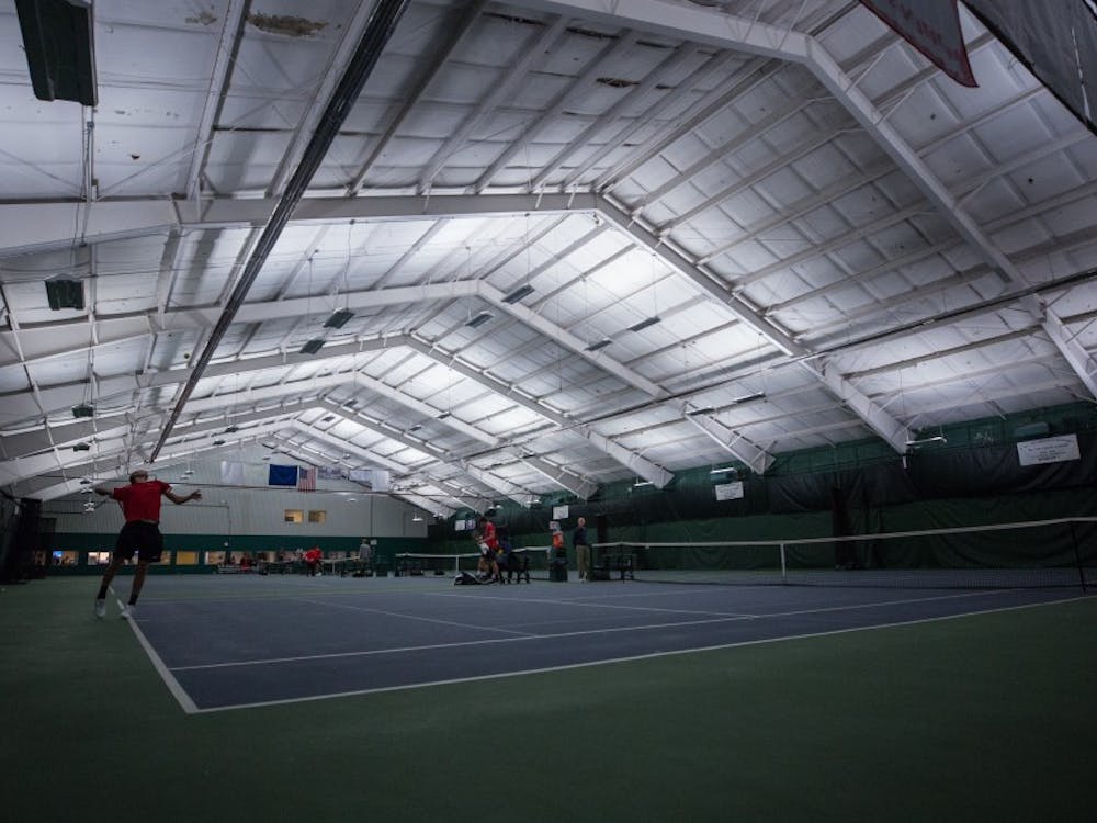 Ball State's mens tennis plays singles matches against the University of Toledo. Ball State won 5 to 2 on March 24 at Northwest YMCA in Muncie. Eric Pritchett, DN