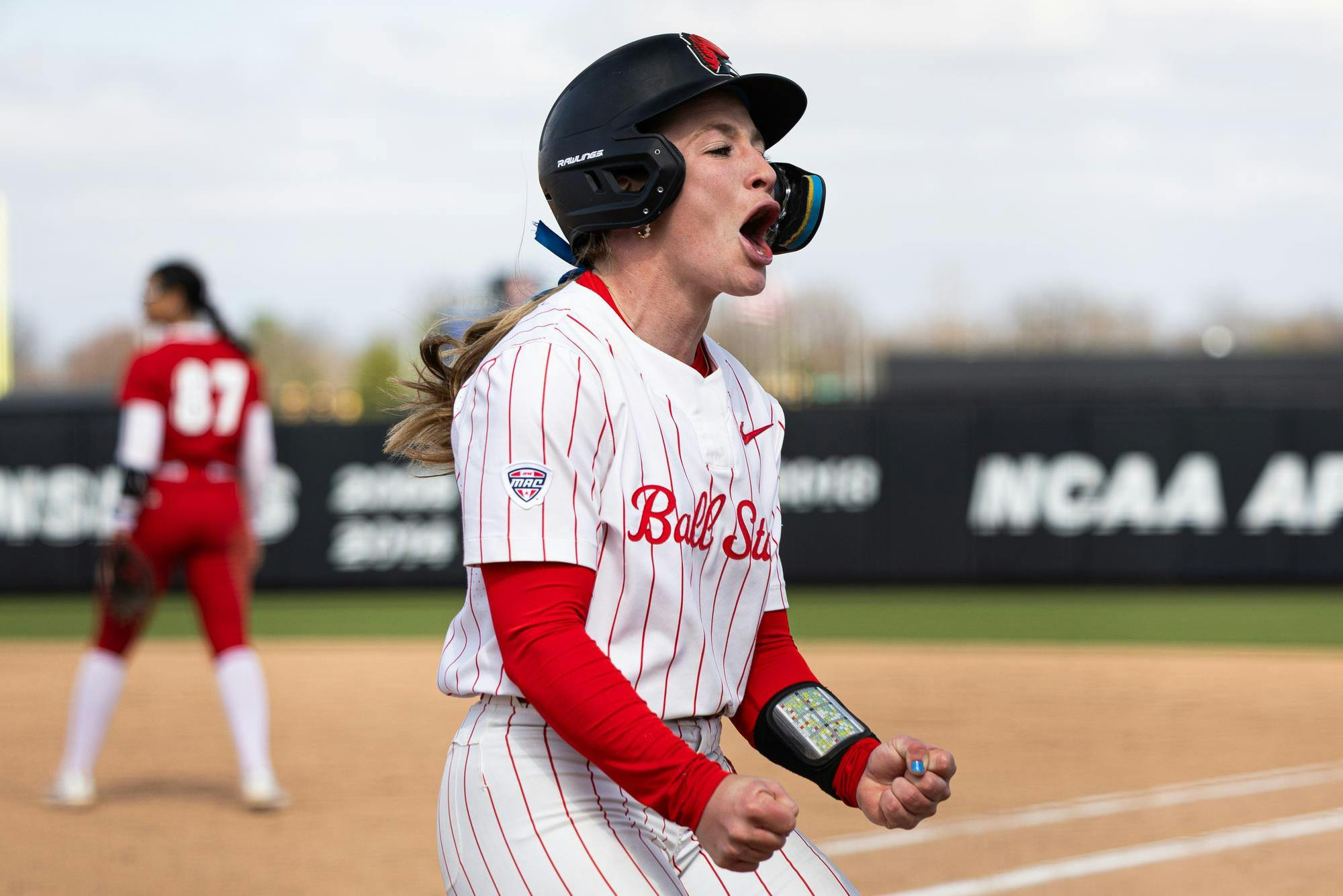 Ball State junior McKenna Mulholland celebrates after scoring a point against Miami Ohio on April 11 at the Ball State softball stadium. Ball State lost 7-4. Titus Slaughter, DN
