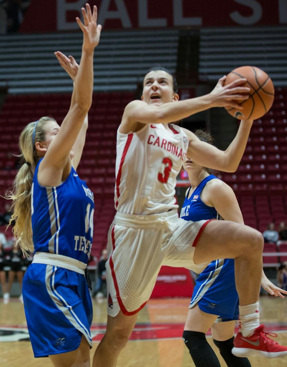 <p>Junior guard Carmen Grande goes for a lay-up in the game March 15 against Middle Tennessee in John E. Worthen Arena. <strong>Eric Pritchett, DN</strong></p>