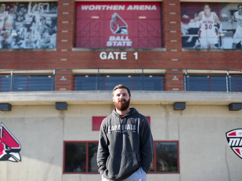 Graduate Assistant Matt Corn poses in front of Worthen Arena Nov. 9. Jacy Bradley, DN