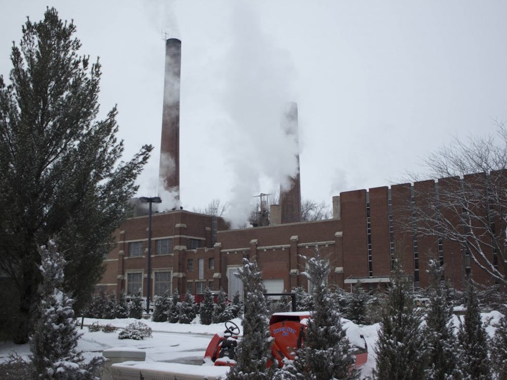 Smoke billows from the coal plant on Ball State
