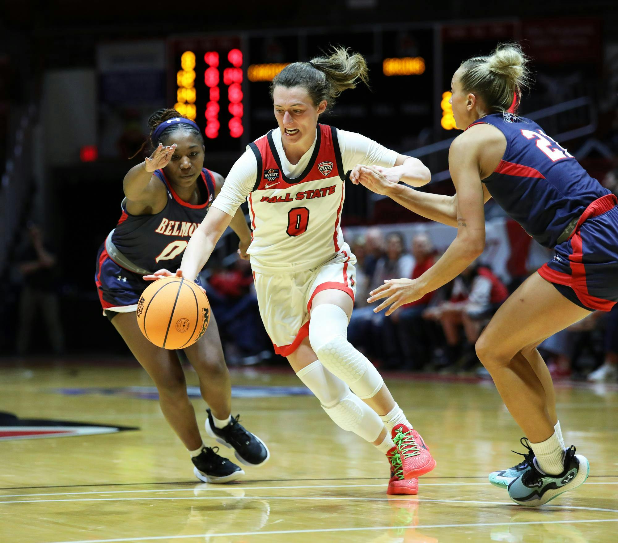 Junior Ally Becki pushes through defenders to the basket against Belmont March 21 at Worthen Arena. Becki played 20 minutes of the game. Mya Cataline, DN