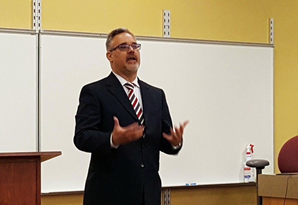 Brian Ott gives opening remarks for his open forum March 22. He is one of three candidates for the next CCIM dean. Sara Barker, DN