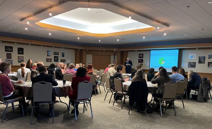 Dr. Chuck Reynolds gives a presentation.