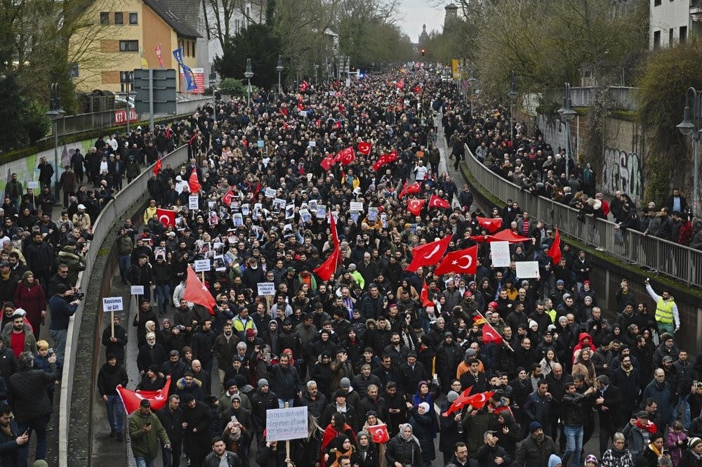 Thousands of people take part in a funeral march Feb. 23, 2020, in Hanau, Germany. Several people were killed in a shooting in the central German city Feb. 19, 2020. (Nicolas Armer/dpa via AP)