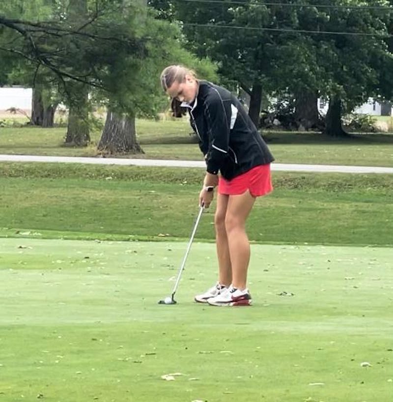 Wapahani senior golfer Delaney Dodd putts Sept. 28 at Edgewood Golf Course during the Lapel Regional. Dodd finihsed the event with a 95. Zach Carter, DN.