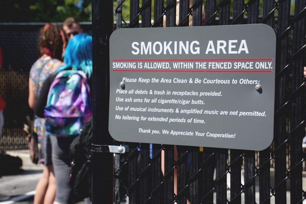 Ball State recently added a fenced in area off of Petty for students and faculty that smoke. Those that wish to take part must stay inside of the area. DN PHOTO SAMANTHA BRAMMER