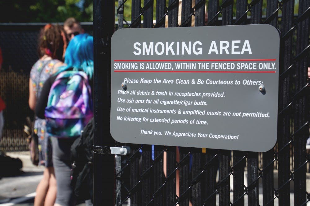 <p>Ball State recently added a fenced in area off of Petty for students and faculty that smoke. Those that wish to take part must stay inside of the area. <em>DN PHOTO SAMANTHA BRAMMER</em></p>
