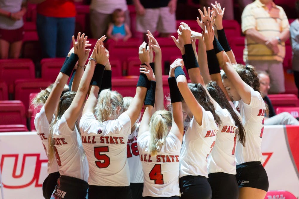 Ball State's women's volleyball team huddle up at the start of game against IUPUI on Aug. 31 at John E. Worthen Arena. Kyle Crawford // DN