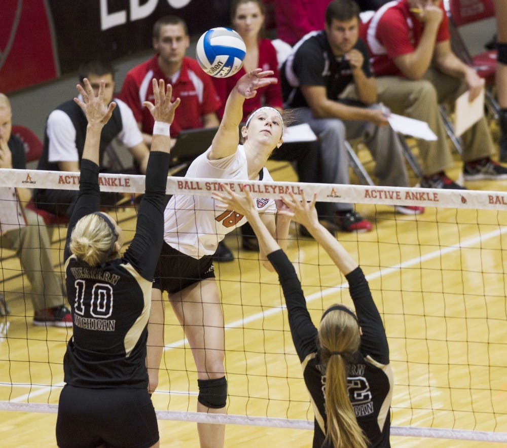 Junior middle hitter Hayley Benson goes in for a kill against Western Michigan on Oct. 11 at Worthen Arena. Benson had 15 kills. Women