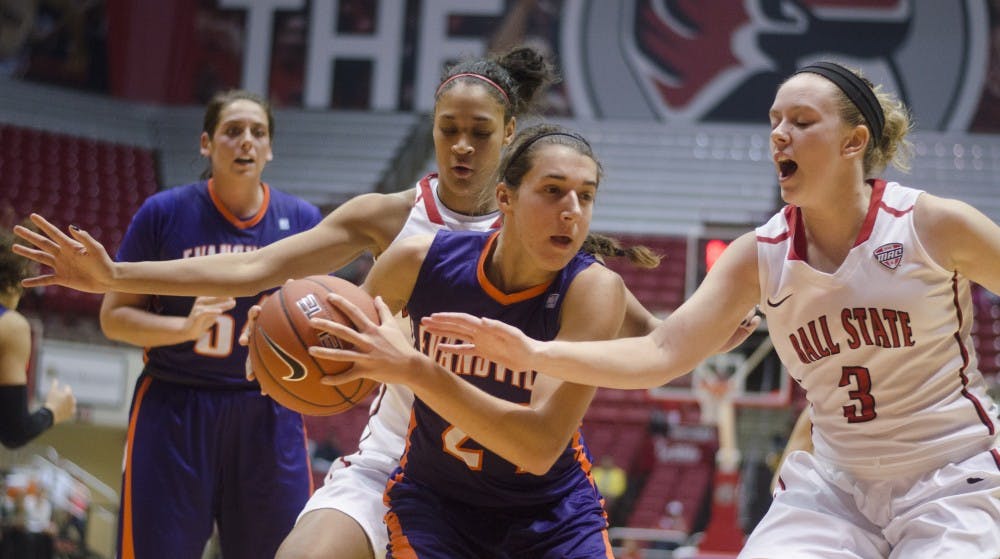 Junior guard Nathalie Fontaine and senior guard Shelbie Justice attempt to get the ball back from an Evansville player during the game on Nov. 19 at Worthen Arena. DN PHOTO BREANNA DAUGHERTY