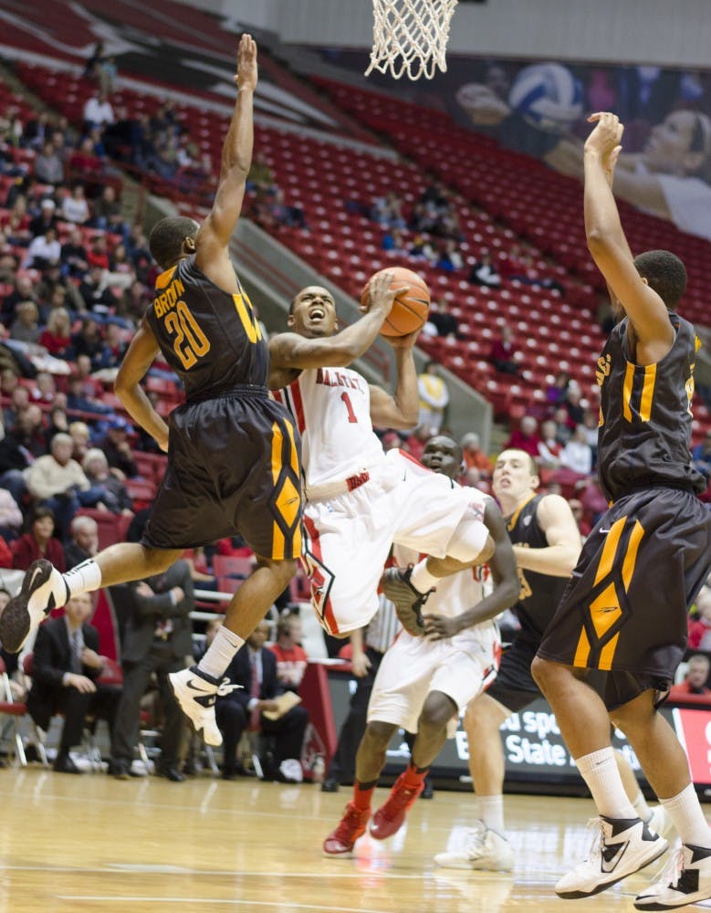 Freshman guard Zavier Turner goes for a shot in the paint against Toledo Feb. 8 at Worthen Arena. Turner scored 19 points for Ball State. DN PHOTO BREANNA DAUGHERTY 