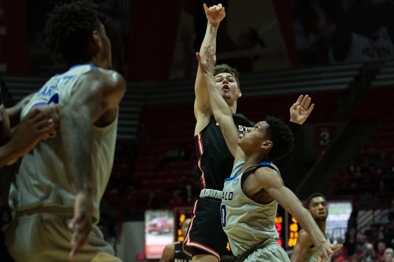 Freshman Luke Bumbalough scores a three pointer against the Buffalo Bulls Jan. 7, 2020, at John E. Worthen Arena. Bumbalough scored nine points against the Bulls. Jacob Musselman, DN