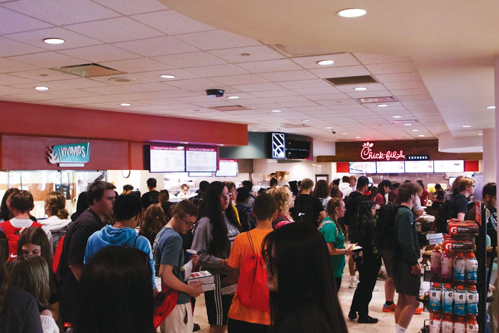  Students stand in line for Chick-fil-A and check out lines Oct. 2 in the Atrium. The Chick-fil-A will be leaving the Atrium and moving to North Dining winter 2024. Olivia Ground, DN