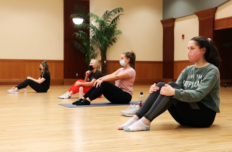 (Left to right) Lily Staatz, Megan Thomas, Choe Freeman and Colleen Dyra sit before a workout for Ball State’s chapter of CHAARG March 18, 2021, in the L.A. Pittenger Student Center. Due to COVID-19 limitations, the organization only meets once a month for in-person workouts. Rylan Capper, DN