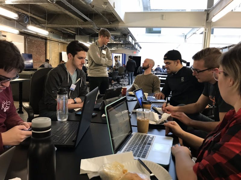 Ball State students Alex Kane and Guadalupe Vega working with their team at the Startup Weekend February in Columbus, Ohio. Startup Weekend is taking place Oct. 5 to 7 in the Applied Technology Building for the first time on Ball State's campus. Karen Lloyd, Photo Provided&nbsp;