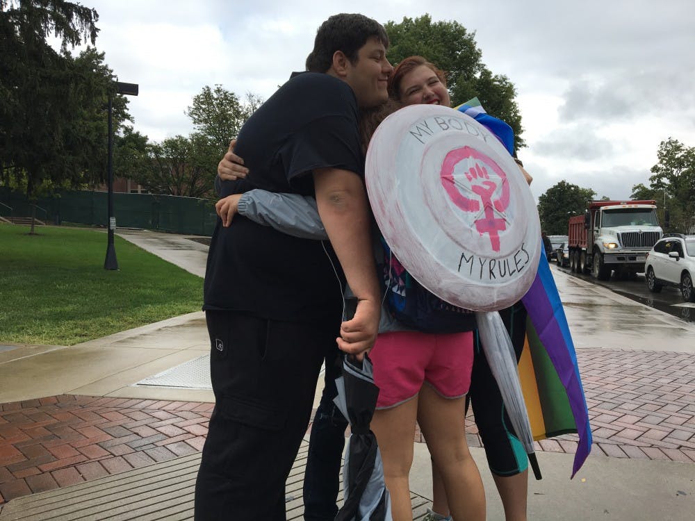 In response to the recent controversial street preachers at Ball State, a group of students formed Students Against On Campus Harassment and stood on the corner of the Scramble Light on Sept. 30 giving out free hugs. The group has&nbsp;banded together to spread the message of "hugs, not hate."&nbsp;Mary Freda // DN&nbsp;