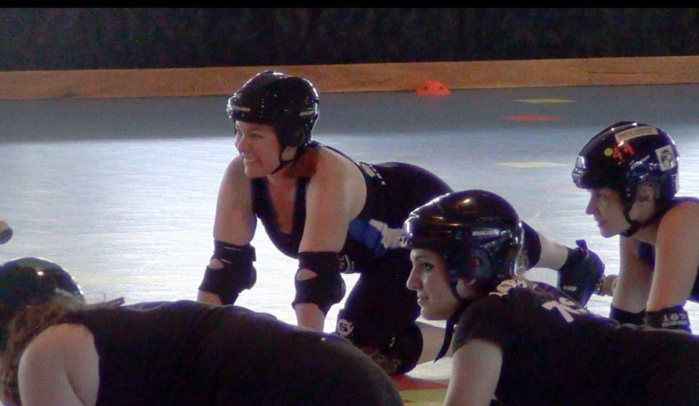 Sarah Gremer's roller derby name is Aria Kiddinme.  Gremer says the sport is "therapy,” a time to focus, the source of a built-in social network. DN PHOTO DANIELLE GRADY