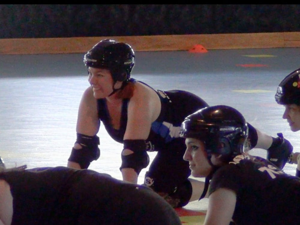 Sarah Gremer's roller derby name is Aria Kiddinme.  Gremer says the sport is "therapy,” a time to focus, the source of a built-in social network. DN PHOTO DANIELLE GRADY