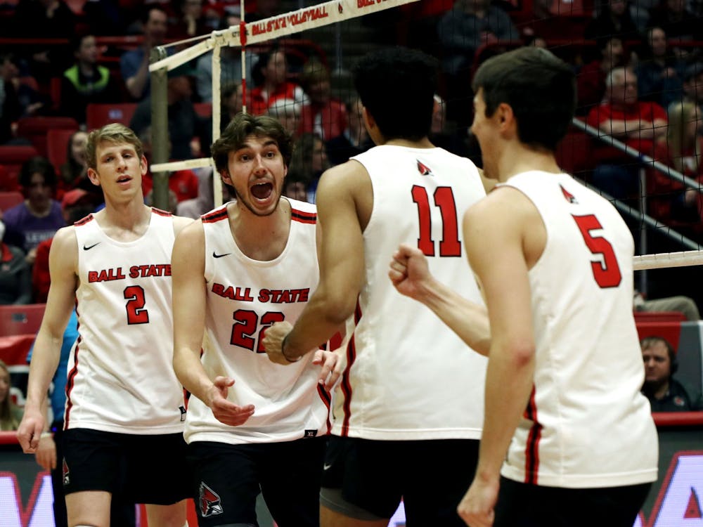 The Ball State men's volleyball team celebrates scoring a point in a game against Ohio St. March 19 at Worthen Arena. The Cardinals won their game 3-1. Amber Pietz, DN