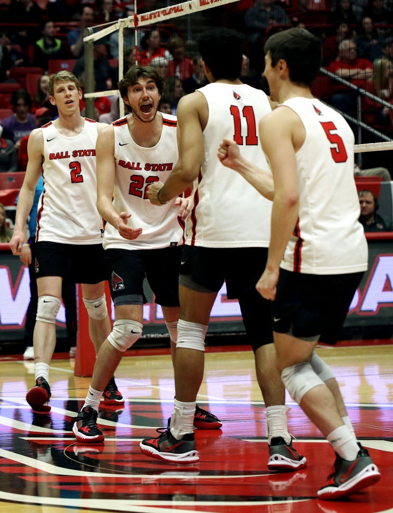 The Ball State men's volleyball team celebrates scoring a point in a game against Ohio St. March 19 at Worthen Arena. The Cardinals won their game 3-1. Amber Pietz, DN