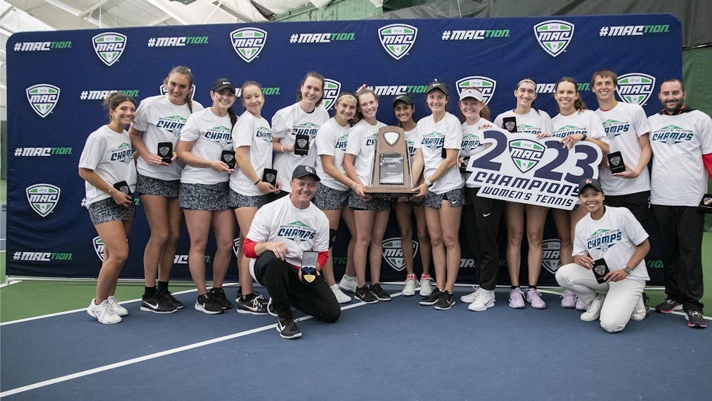 The Ball State Women's Tennis team poses with the Mid-American Conference (MAC) Tournament Championship after defeating Toledo April 30. Ball State Athletics, photo courtesy 