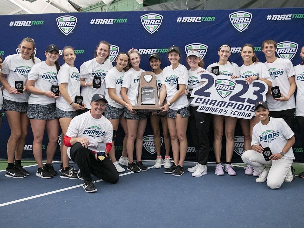 The Ball State Women's Tennis team poses with the Mid-American Conference (MAC) Tournament Championship after defeating Toledo April 30. Ball State Athletics, photo courtesy 