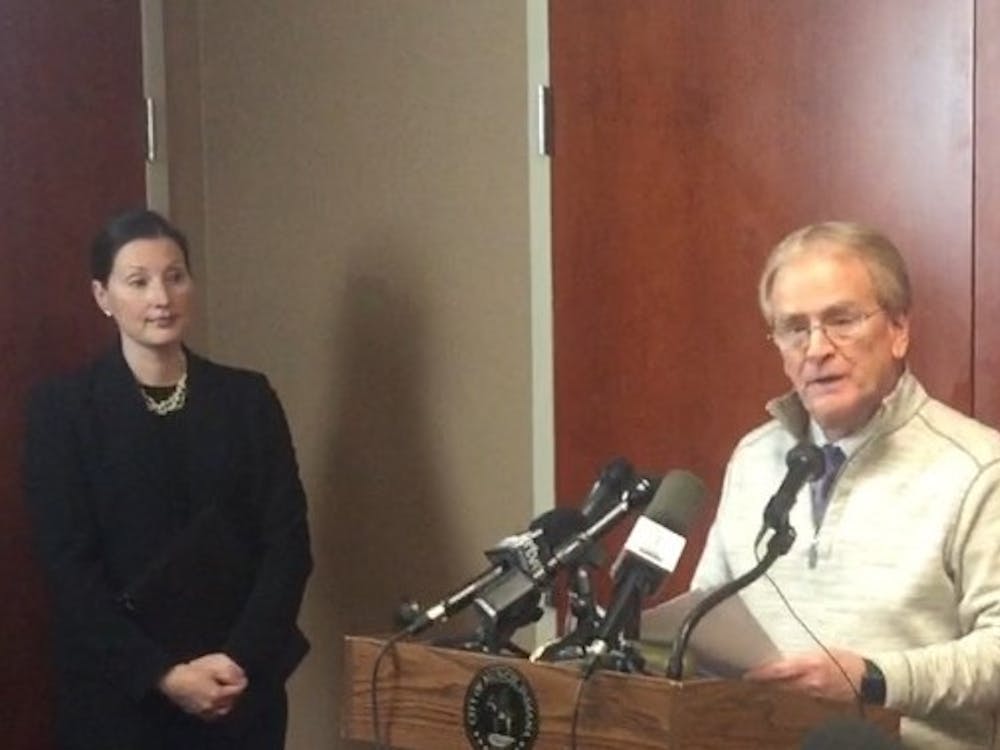 (From left) City Attorney Megan Quirk and Muncie Mayor Dennis Tyler held a press conference today in response to the arrest of Muncie’s building commissioner on Wednesday. Craig Nichols, 38, was charged with 16 counts of wire fraud, one count of theft of government funds and 16 counts of money laundering, according to the indictment. Max Lewis // DN
